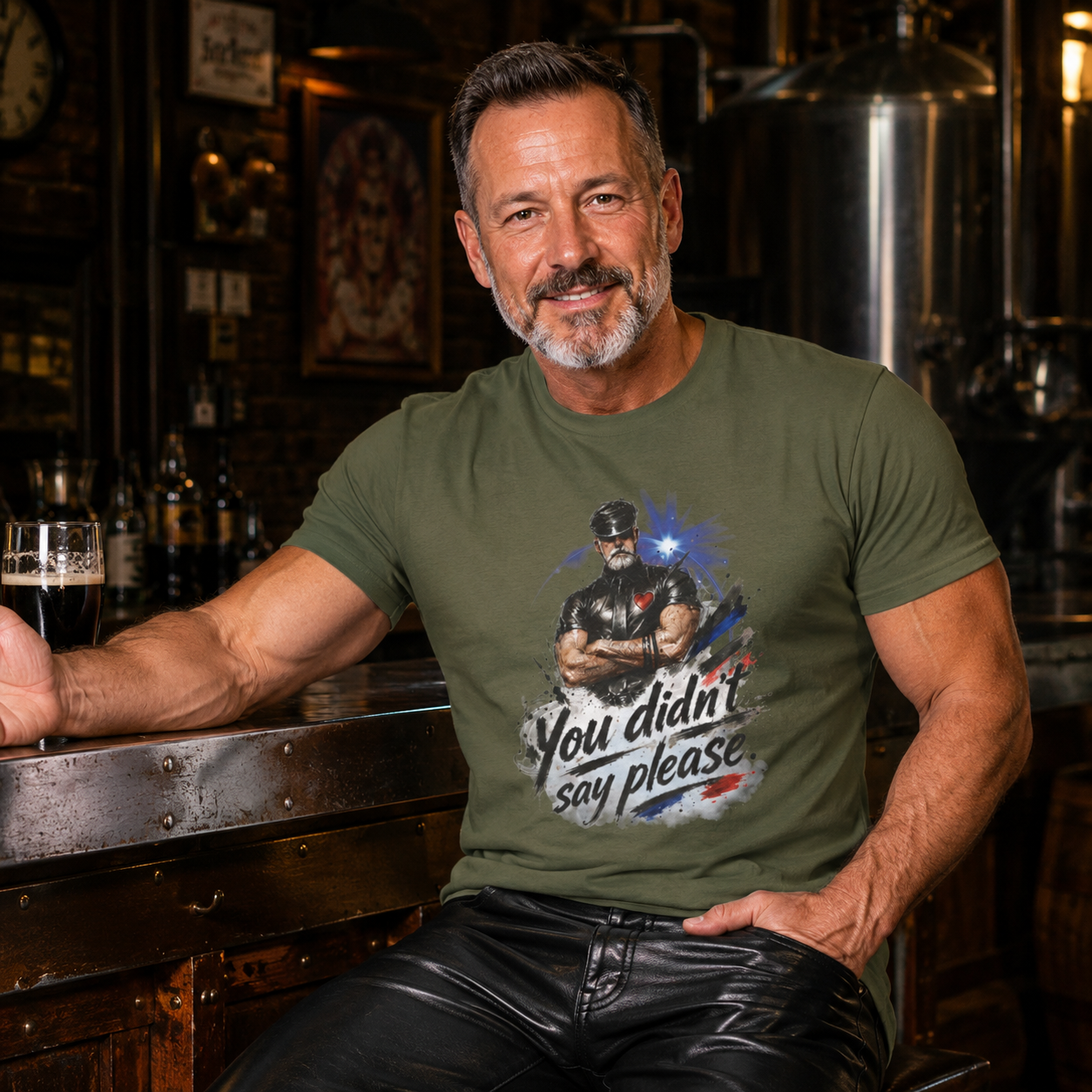 T-Shirt — "You Didn't Say Please" Leatherman graphic of an Alpha male in leather